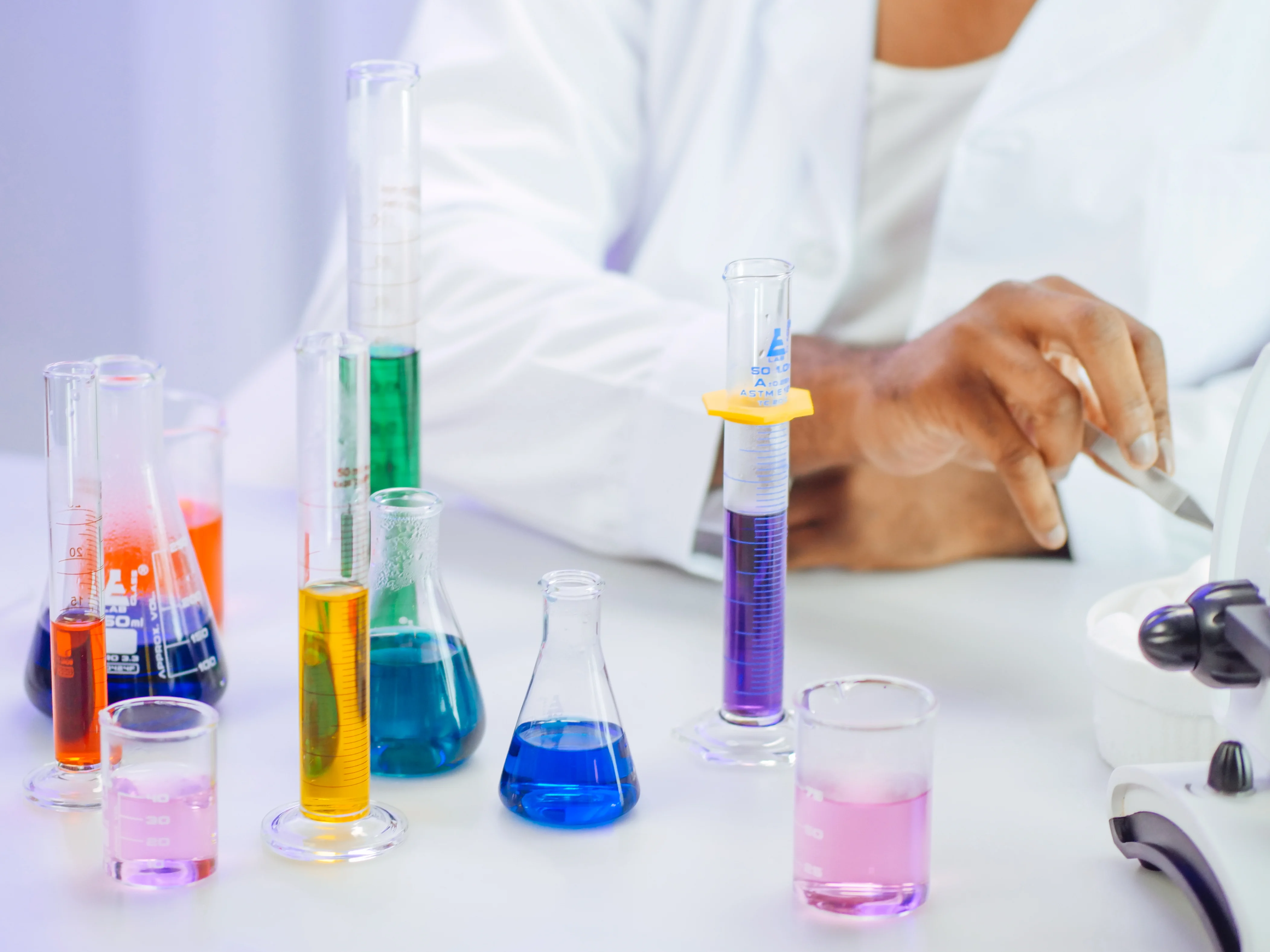 Lab technician measuring reagents in a Namibian laboratory